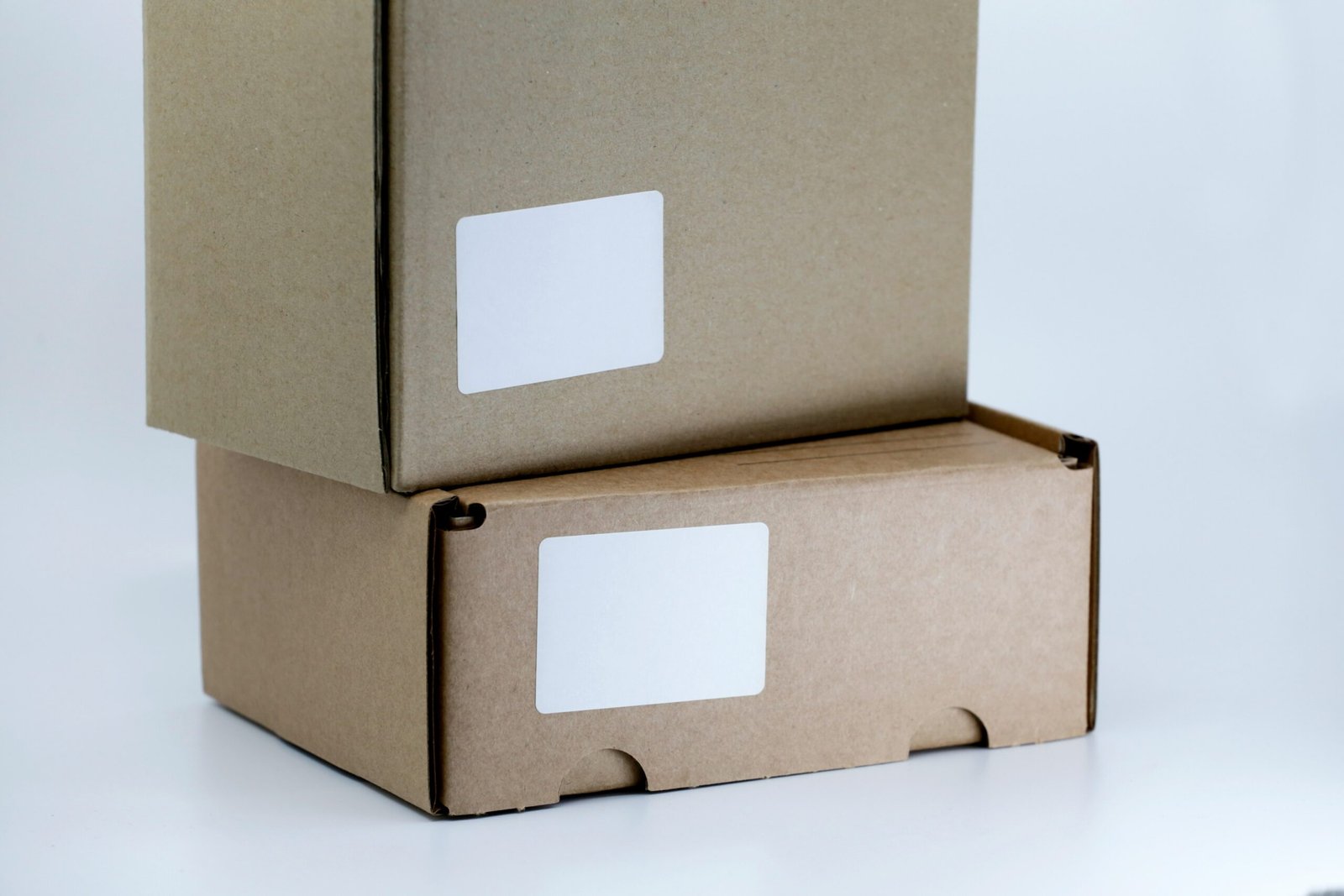 Brown Cardboard Box On White Table